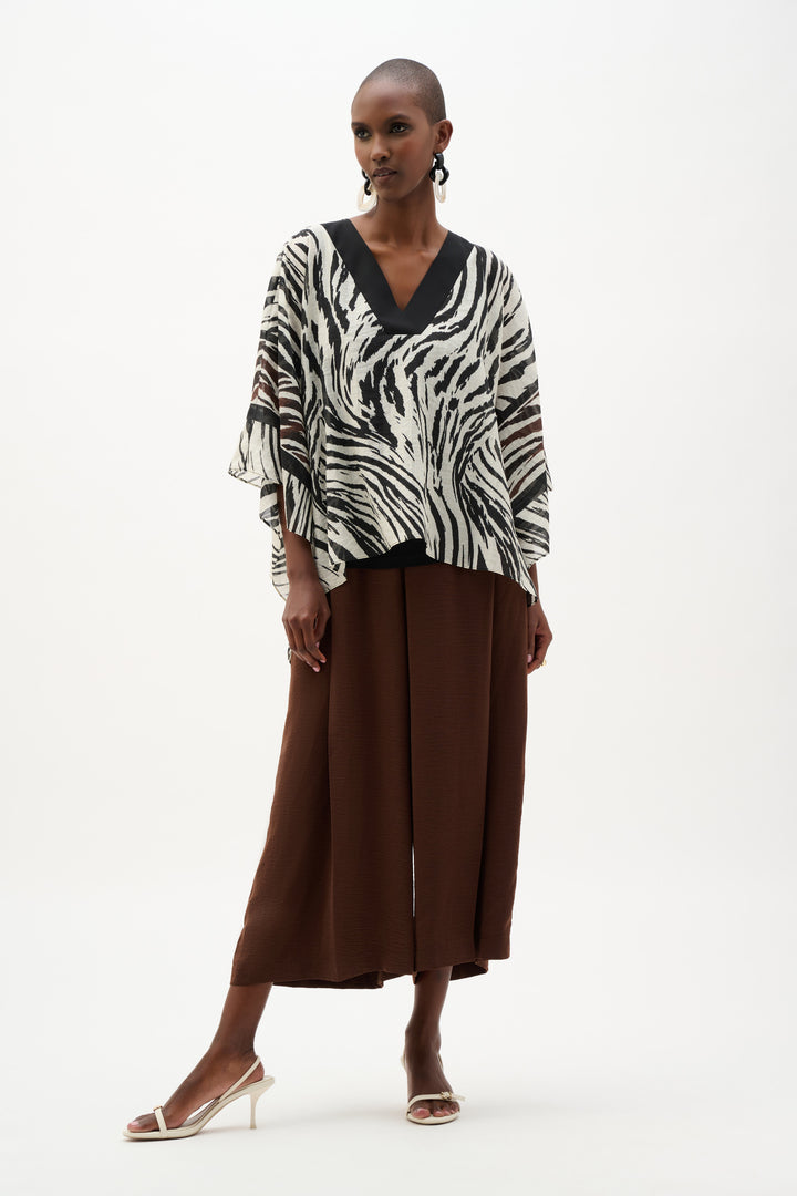 Sheer Woven Animal Print And Silky Knit Poncho Top 262203