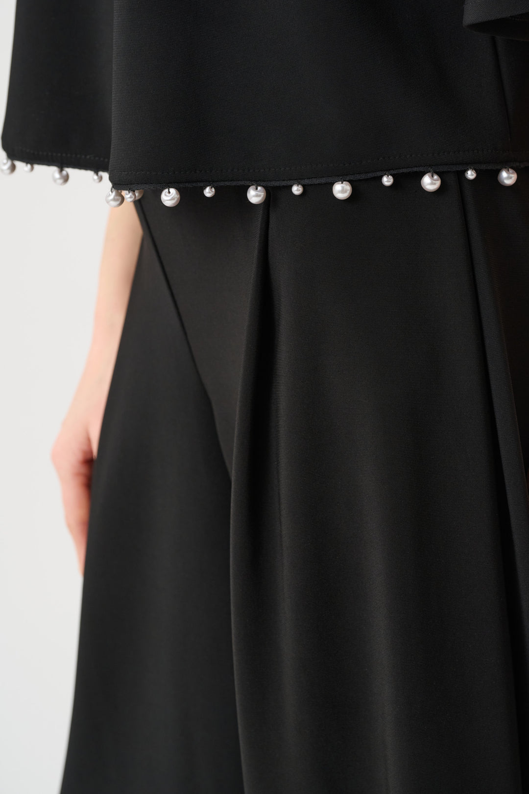 Silky Knit Flared Top With Pearl Detail Style 263116