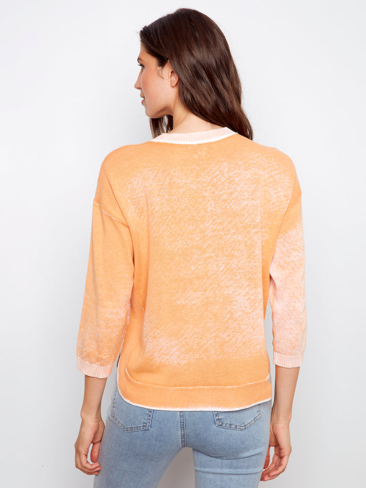 Reversed Print 3/4 Sleeve Sweater With Curved Hem
