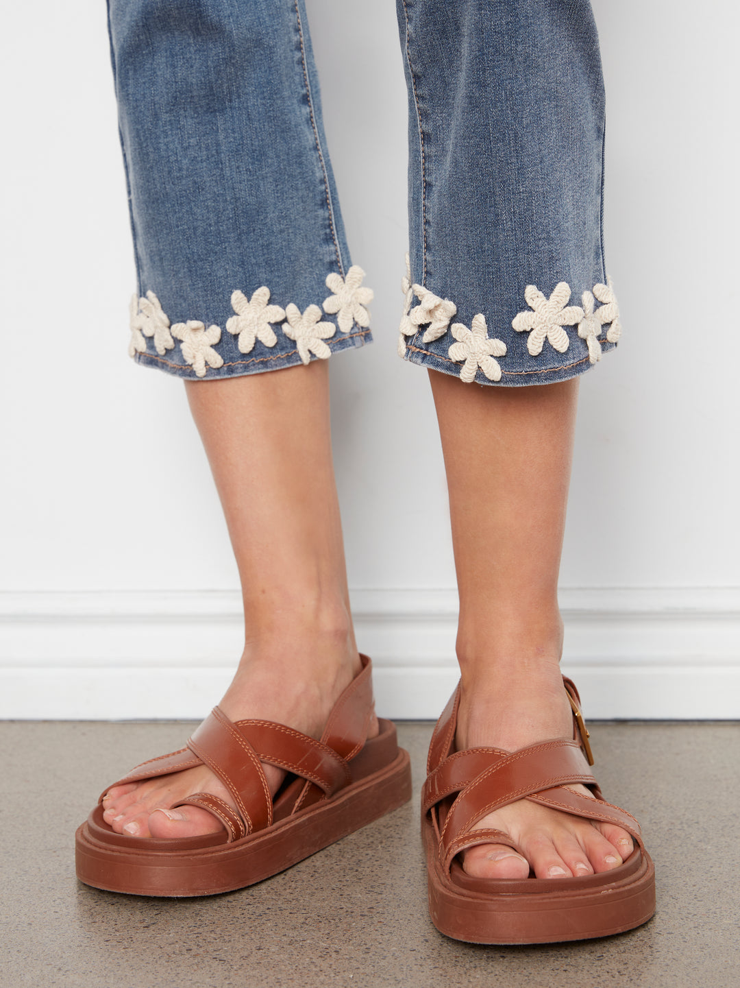 Flare Leg Stretch Denim Pants With Floral Trim At Hem