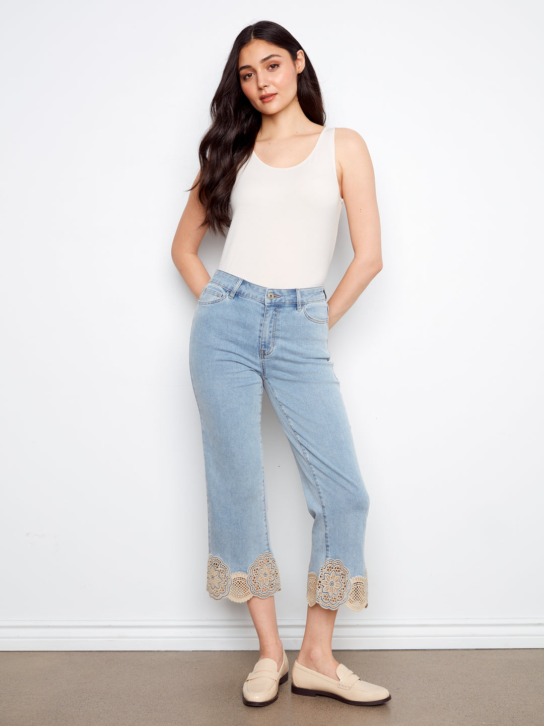 Stretch Denim Flare Leg Pants With Laser Cut Lace At Hem
