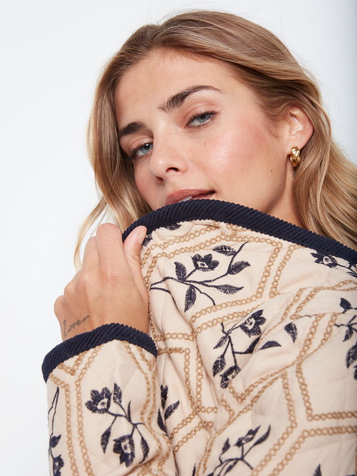 Embroidered Puffer With  Edge Binding